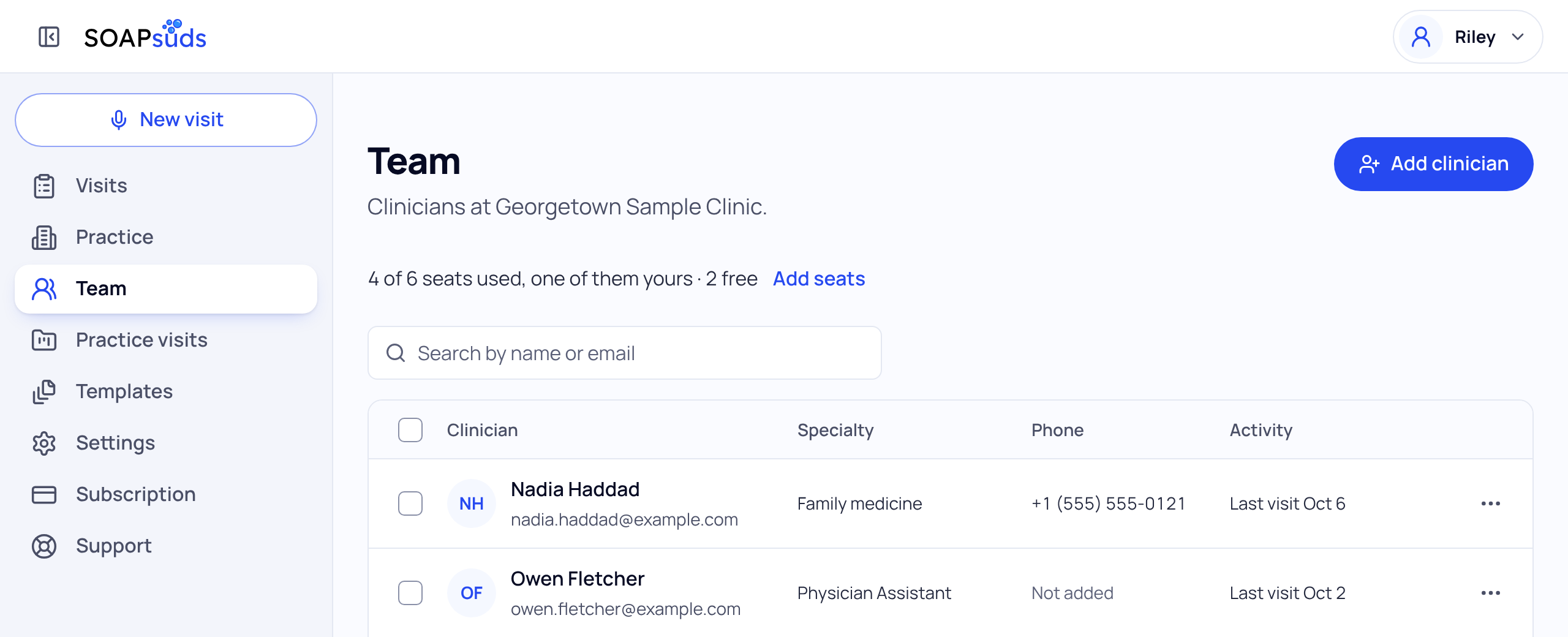 The Team page with the Add clinician button at the top right and the seats line under the title
